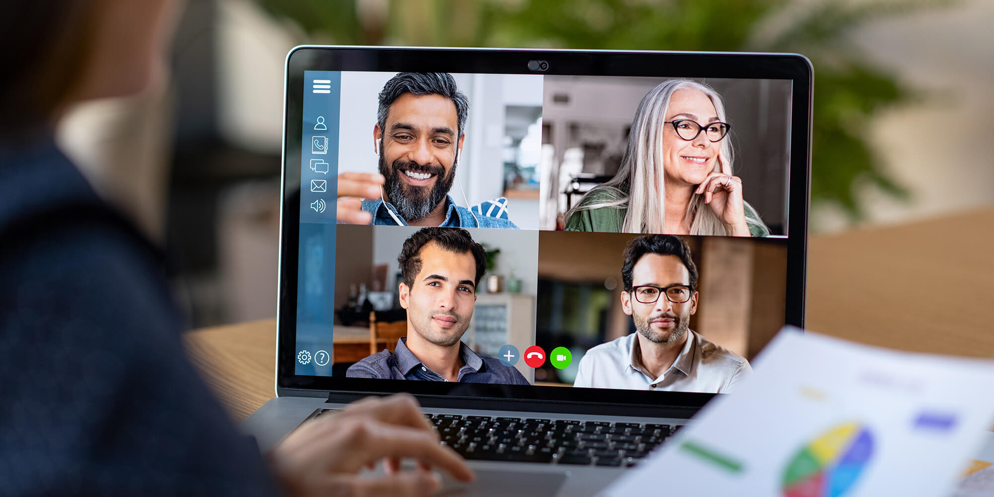 A video conference call on a laptop.